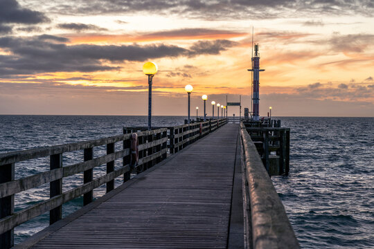 Fototapeta Germany, Mecklenburg-Vorpommern, Wustrow, Empty pier at dusk
