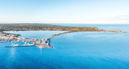 Spain, Balearic Islands, Formentera, Drone view of town on Mediterranean shore