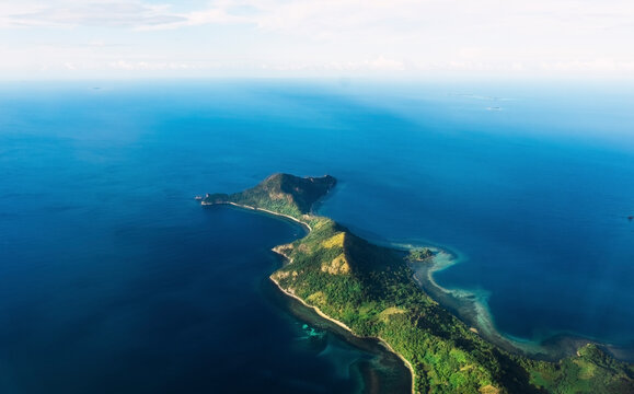 Coron island amidst blue sea in Philippines
