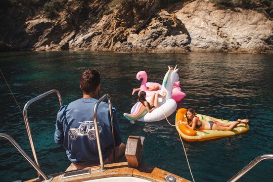 Friends enjoying vacation at sunny day