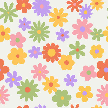 Trendy floral seamless pattern.  Vintage 70s style hippie groovy flowers background. Colorful bright colors. Vector y2k nature backdrop with daisy flowers.