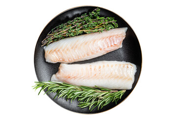 Raw cod loin fillet steaks with herbs on plate.  Isolated, transparent background.