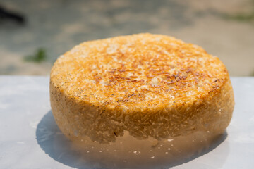 The rice crust is dried in the sun before being processed into traditional food. The rice crust or peep is the burnt part of the rice cooking process