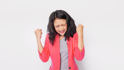  Photo of ecstatic asian woman shout loud yeah fist up raise win lottery isolated bright shine color background