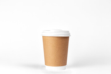 Disposable paper cup on a white background isolated.
