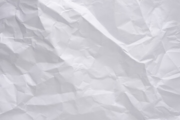 White crumpled paper texture background, clean white wrinkled paper, top view.