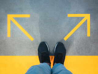 Man Standing with Arrow Direction Choice Left and Right 