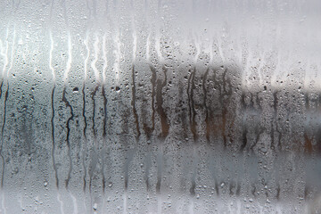 Obraz na płótnie Canvas misted window in cloudy weather.