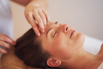Fototapeta na wymiar Woman having japan style face massage in salon