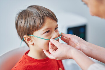 Picture of young boy having molecular hydrogen inhalation