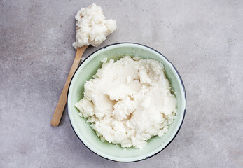 Traditional South African staple, pap or maize meal. Plain in an enamelware bowl. An only meal in time of poverty.