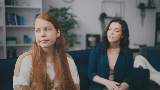 Mature woman fighting with her teen daughter, difficult phase, teenage years