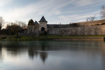 Fototapeta premium Medieval fortress on riverbank at evening, Kastel fortress on riverbank of Vrbas river in Banja Luka