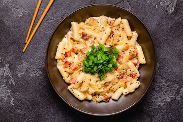 Spicy Rice Cake with Cheese and Bacon or Cream Teokbokki, Tteokbokki.