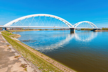 Fototapeta na wymiar Zezelj bridge, a tied-arch bridge on Danube river in Novi Sad, Vojvodina, Serbia.