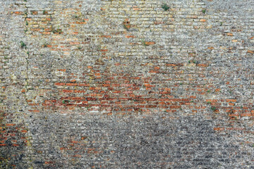 Background of an old worn large brick wall texture