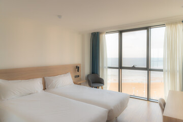 Twin hotel room with sea view
