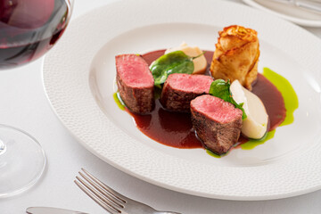 duck with berry sauce on white background