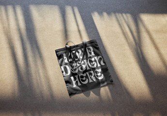 Mockup of customizable tote bag against customizable background