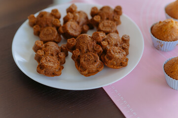 chocolate sponge cookies freshly baked on the table. Baking, cookies in the shape of a bear. chocolate cupcake