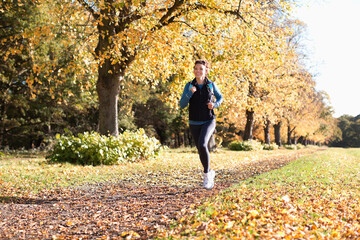 Woman running in park