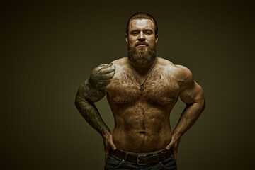 Fototapeta na wymiar muscular tattooed man