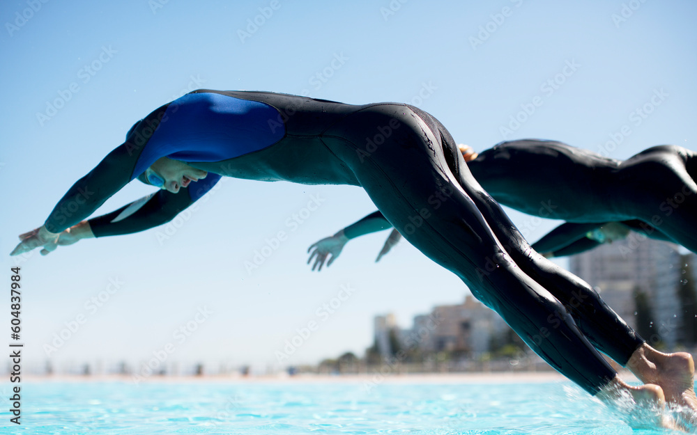 Canvas Prints triathletes diving into swimming pool