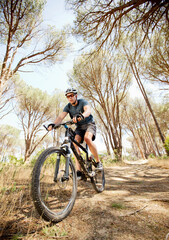 mountain biker on dirt path