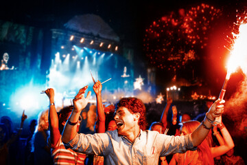 Fans with fireworks at music festival