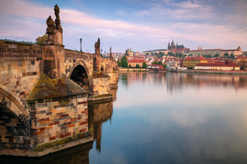 Prague, Czech Republic. Cityscape image of Prague, capital city of Czech Republic, with the iconic Charles Bridge at sunrise.
