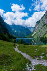 Obersee lake amidst green hills at Eifel National Park- Germany