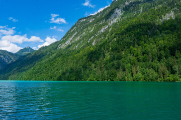Fototapeta na wymiar Obersee lake amidst green hills at Eifel National Park- Germany