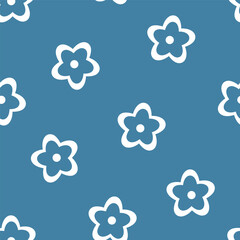 Blue seamless pattern with white daisies