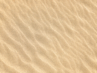 Sand. Texture, surface of sea sand. Natural background. Waves of sand. Seascape. Dunes. Copy space 