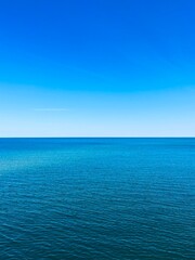 Obraz premium Blue sea horizon, blue sea and blue sky, pure seascape background