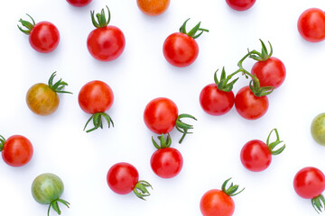 Red cherry tomatoes isolated on white background.Top view. Flat lay. Tomato seamless texture pattern background.