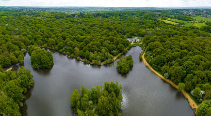 Aerial view of Connaught Water lake Epping park in Essex, England