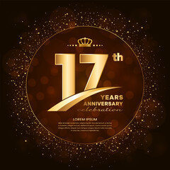 17th anniversary logo with gold numbers and glitter isolated on a gradient background