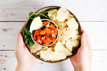 Tomato salsa with tortilla chips. - obrazy, fototapety, plakaty