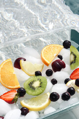Freshness in the background. Chunks of fresh frozen fruit. 
