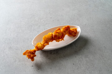 Large fried shrimp, big fried pepper, squid, sweet potato, bread, and fried food