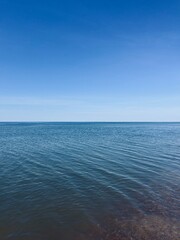 Obraz premium Natural sea pebbles, wet pebbles, small pebble background