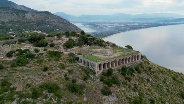This aerial drone video shows the tempio di giove anxur in Terracina, Italy. The old temple is located on the mountain and has a beautiful view over the sea. 