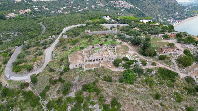 This aerial drone video shows the tempio di giove anxur in Terracina, Italy. The old temple is located on the mountain and has a beautiful view over the sea. 