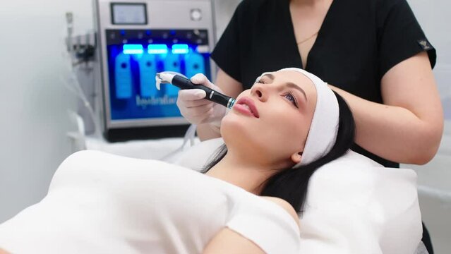 Modern cosmetology. Close up of a modern device for hydrafacial procedure used for face cleansing