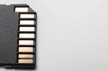 The contact group of the SD flash memory card is black on a gray background. macro close-up