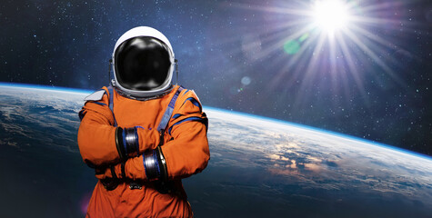 Astronaut in space suit in space near Earth surface. Space collage with spaceman of Artemis crew. Earth orbit. Elements of this image furnished by NASA