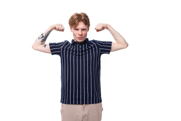 handsome strong 25 year old blond male with tattoos in striped polo