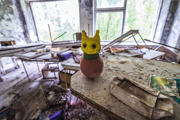 Toy in Cheburashka kindergarten in Pripyat abandoned city in Chernobyl Exclusion Zone, Ukraine