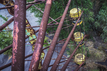 Ferris wheel in amusement park of Pripyat abandoned city in Chernobyl Exclusion Zone, Ukraine